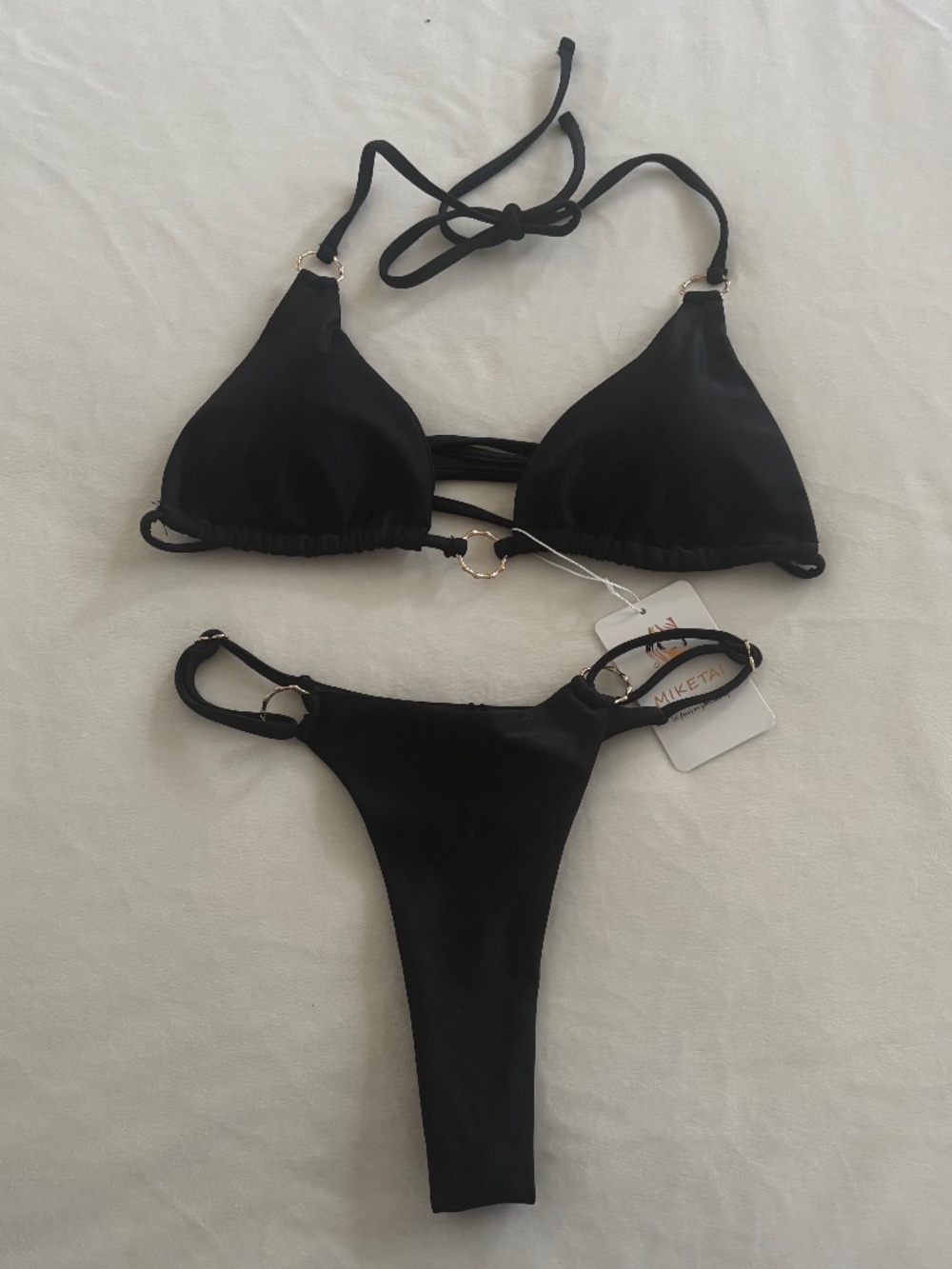 Miketai Bikini Suit Solid Black Metallic Gold Hoops Thong Tie Back Women XS NWT